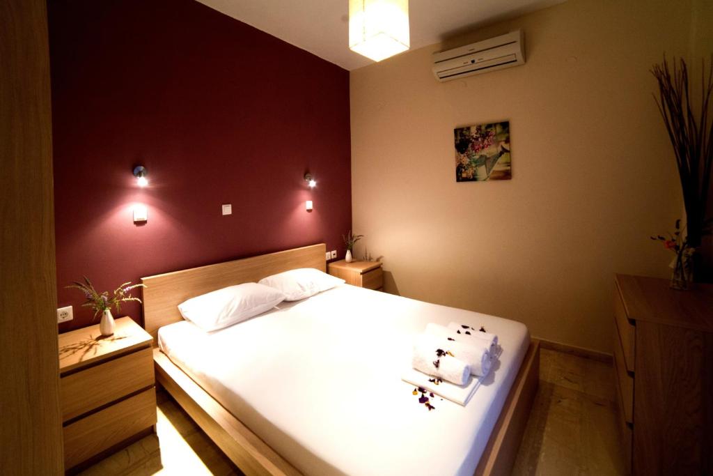 Posteľ alebo postele v izbe v ubytovaní Calma Apartments & Studios