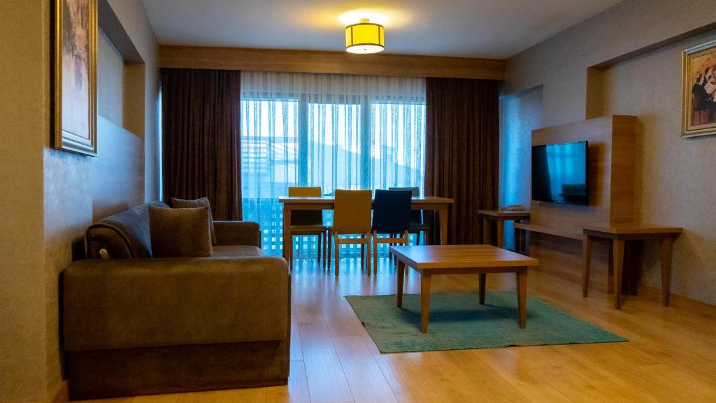 TV a/nebo společenská místnost v ubytování Bursa Suites Apart Otel