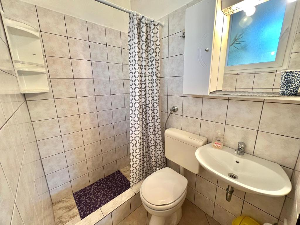Kúpeľňa v ubytovaní Apartmani Zeleni Raj