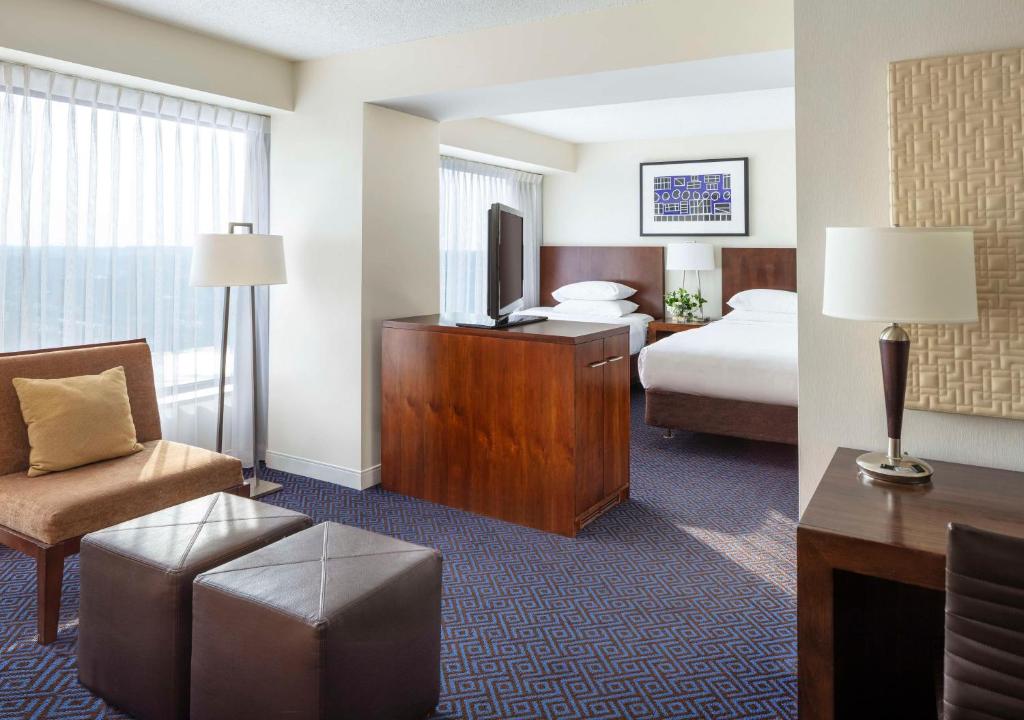 Postel nebo postele na pokoji v ubytování Hyatt Regency Lisle near Naperville