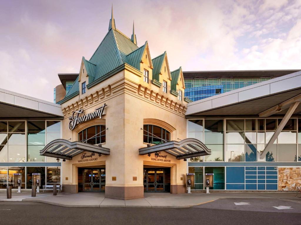 a building with a roof on top of it at Fairmont Vancouver Airport In-Terminal Hotel in Richmond