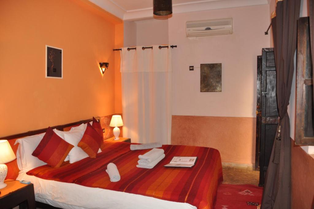 Postel nebo postele na pokoji v ubytování Riad des Etoiles