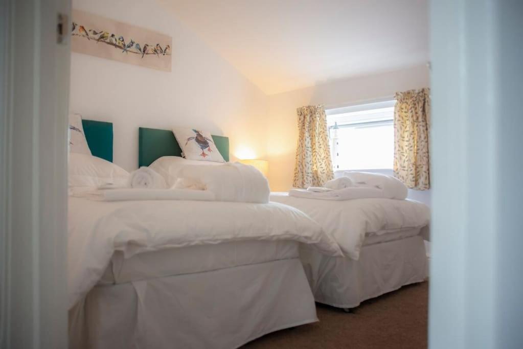 מיטה או מיטות בחדר ב-Jewel Pier *2 Bed House* Deal