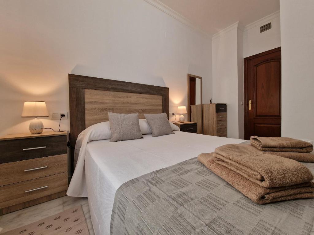 Postel nebo postele na pokoji v ubytování DS Cuesta del Bailio, parking opcional