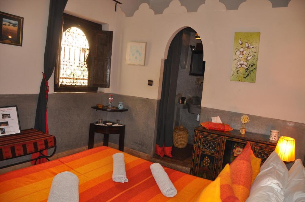 Postel nebo postele na pokoji v ubytování Riad des Etoiles