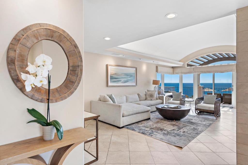 a living room with a couch and a table at Laguna Villa in Laguna Beach