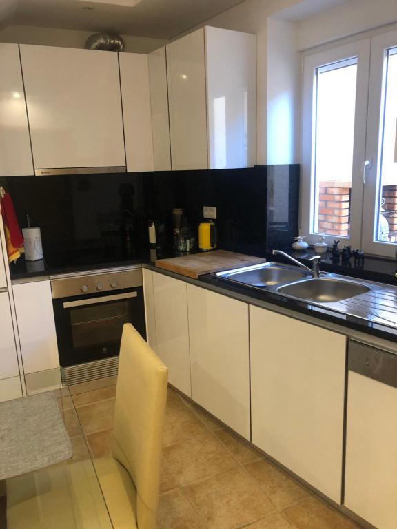 Kuchyň nebo kuchyňský kout v ubytování La petite maison