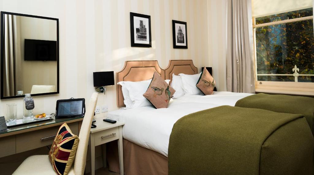 Postel nebo postele na pokoji v ubytování Hotel Xenia - Autograph Collection