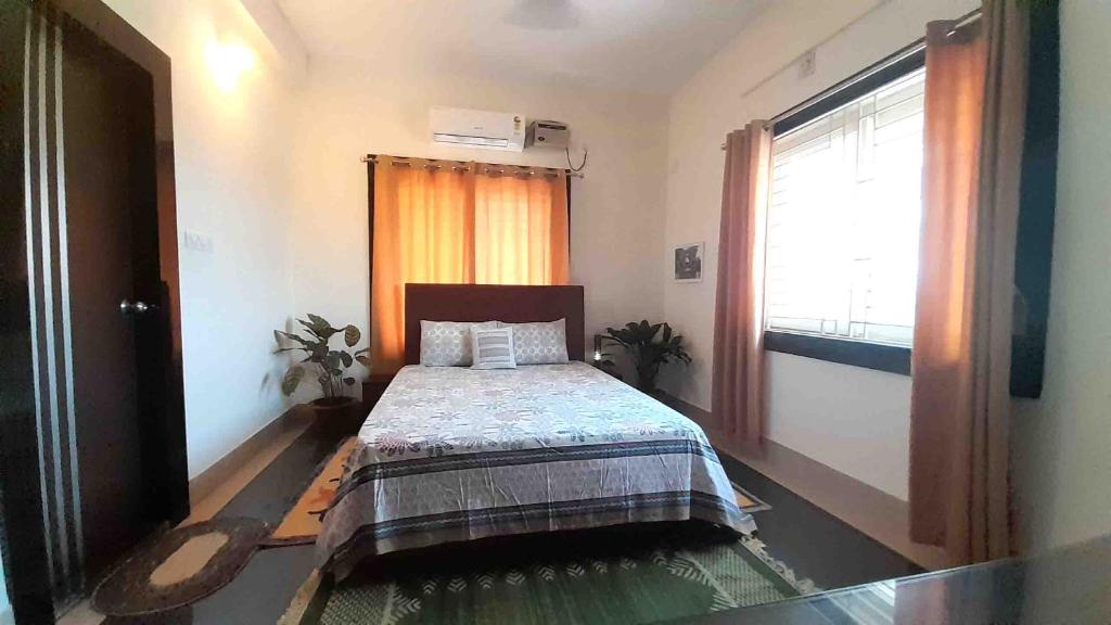 Postel nebo postele na pokoji v ubytování Sublime Homestay