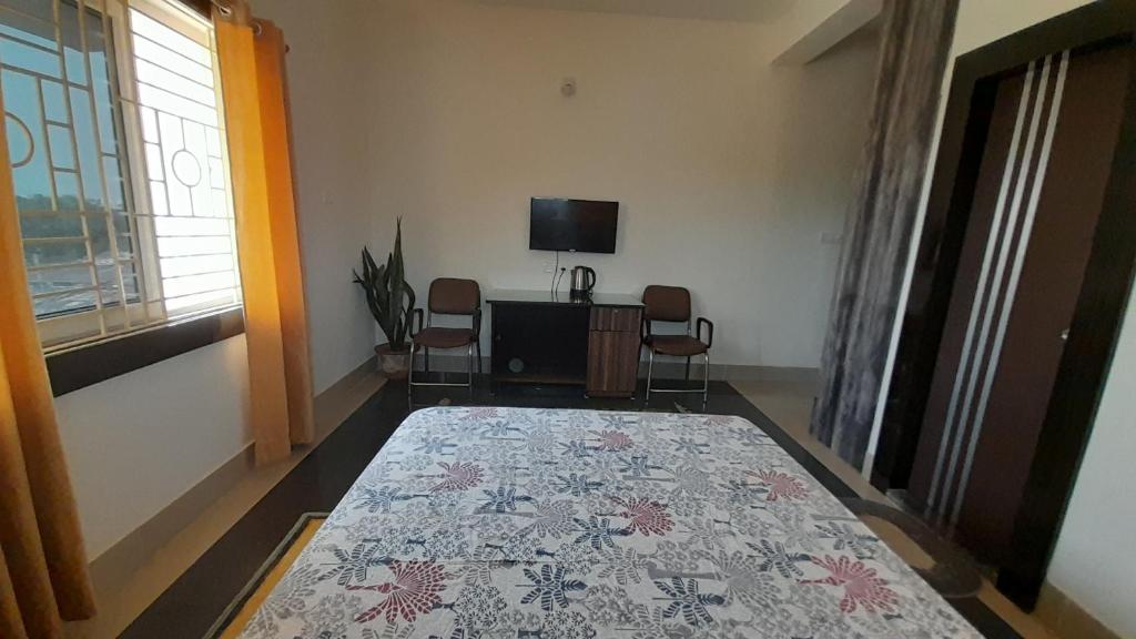 TV a/nebo společenská místnost v ubytování Sublime Homestay