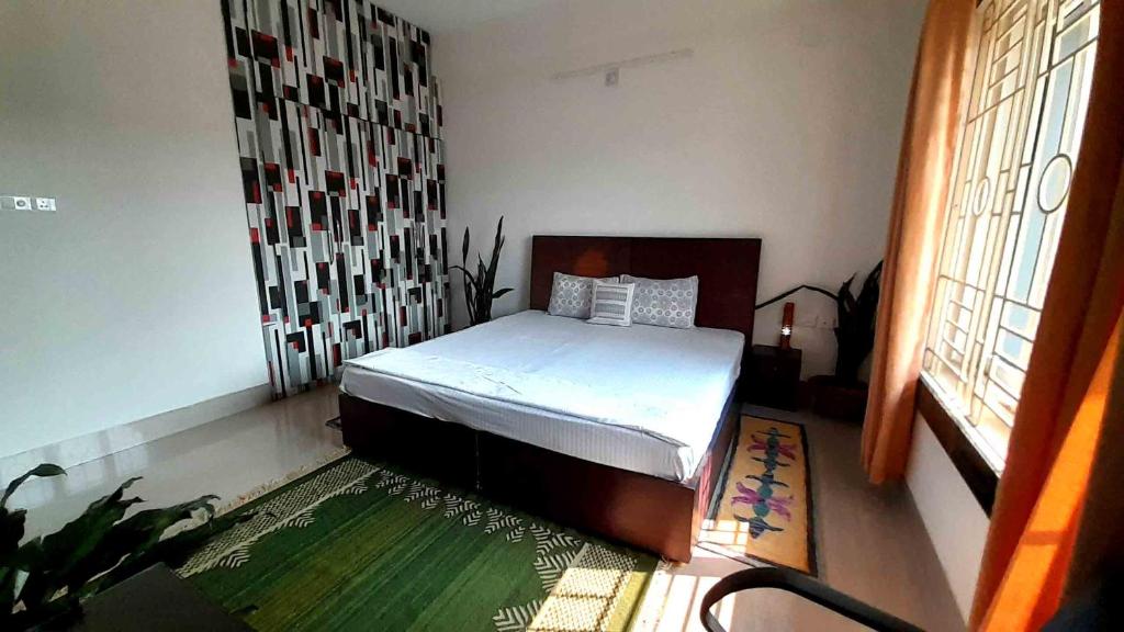 Postel nebo postele na pokoji v ubytování Sublime Homestay