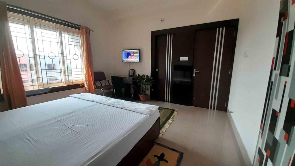 TV a/nebo společenská místnost v ubytování Sublime Homestay
