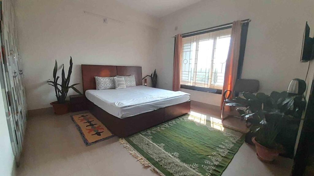 Postel nebo postele na pokoji v ubytování Sublime Homestay
