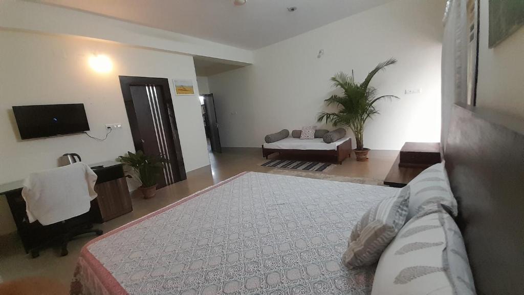TV a/nebo společenská místnost v ubytování Sublime Homestay