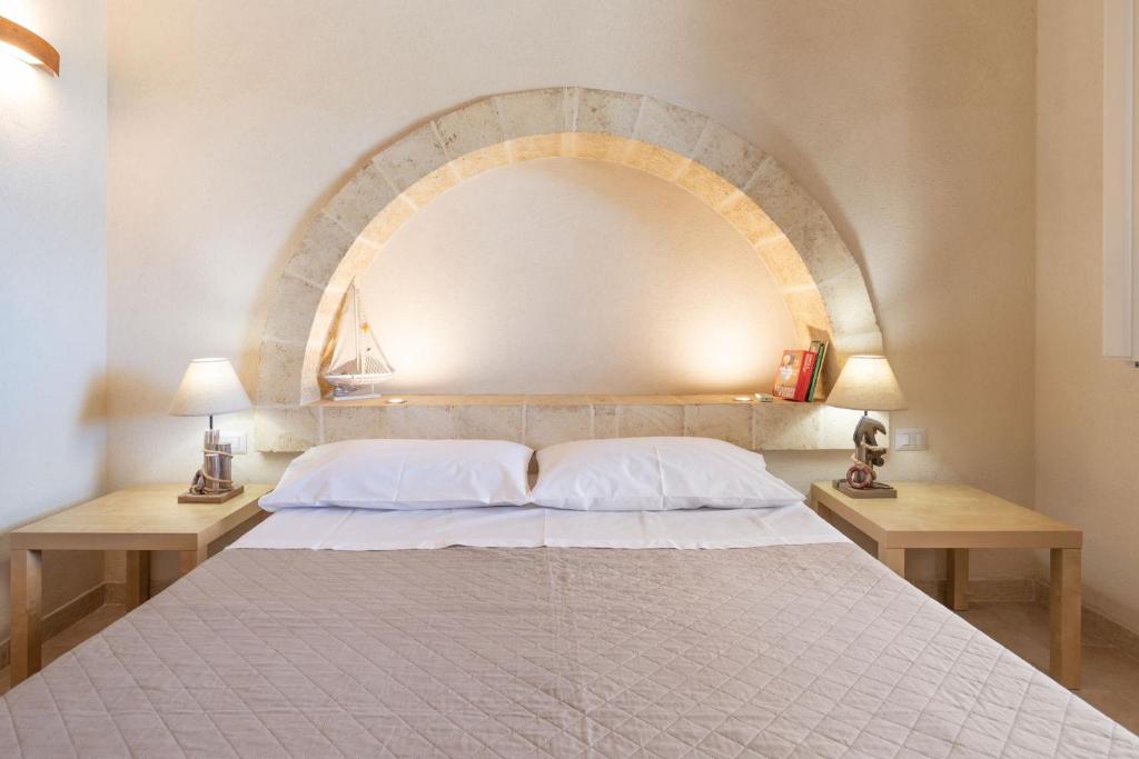 Кровать или кровати в номере VILLA Alessandra