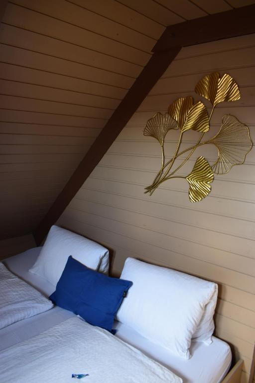 Postel nebo postele na pokoji v ubytování Chalet im See- Nr 44