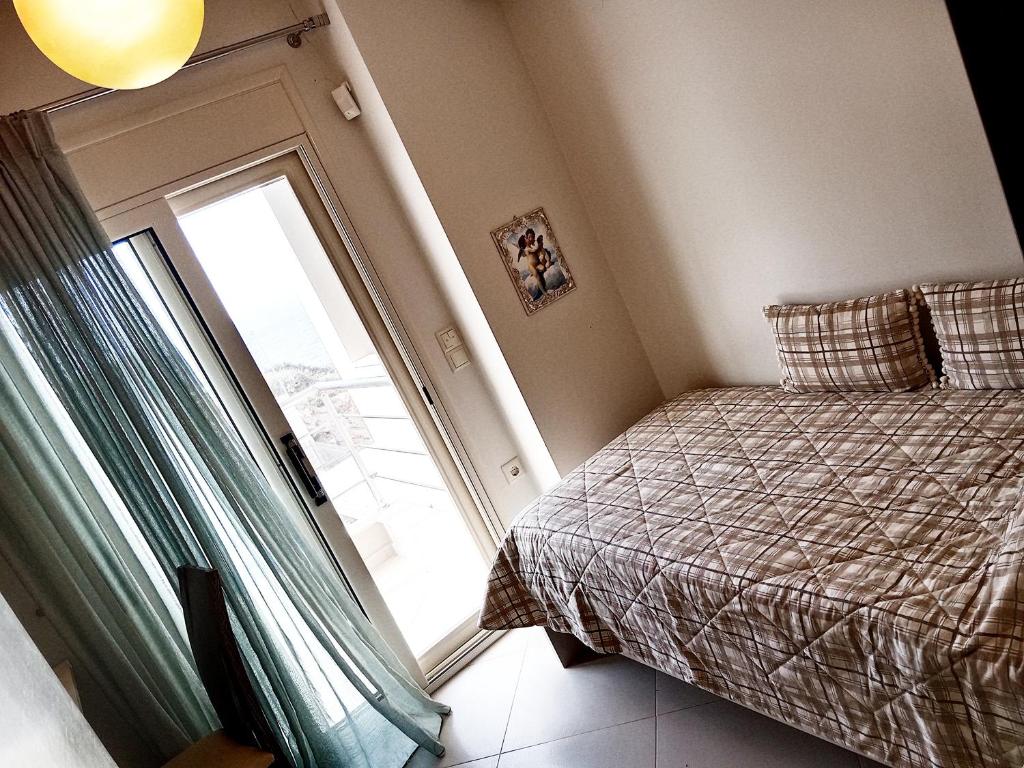 Postel nebo postele na pokoji v ubytování Korfe Estate