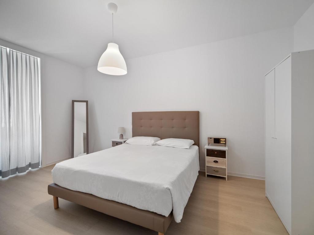 Postel nebo postele na pokoji v ubytování Casa Cattaneo