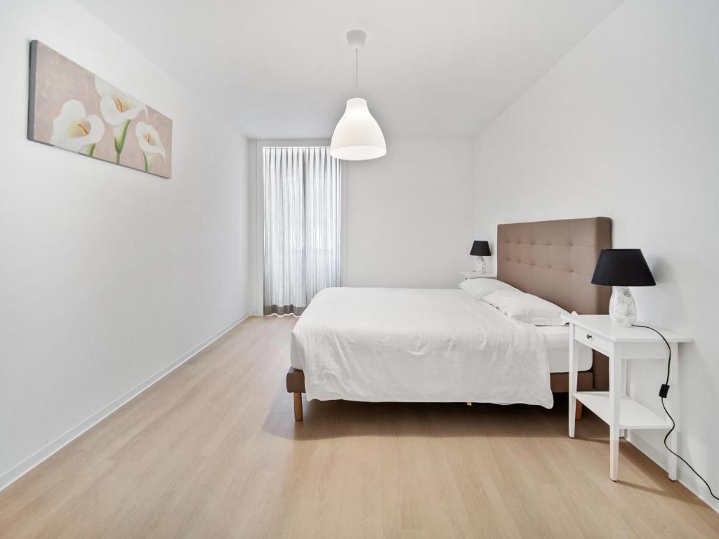 Postel nebo postele na pokoji v ubytování Casa Cattaneo