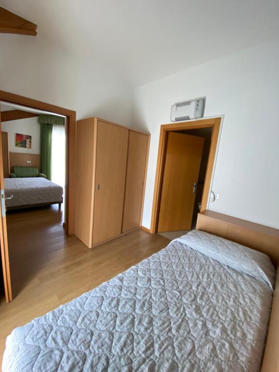 Postel nebo postele na pokoji v ubytování Al Brenta