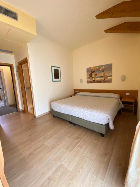 Postel nebo postele na pokoji v ubytování Al Brenta