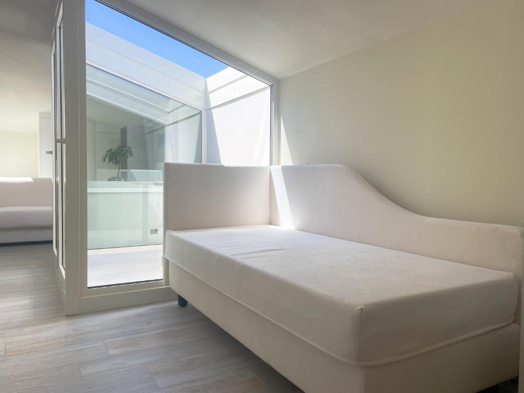 Doride Suites Boutique Hotel - Deluxe Vierbettzimmer