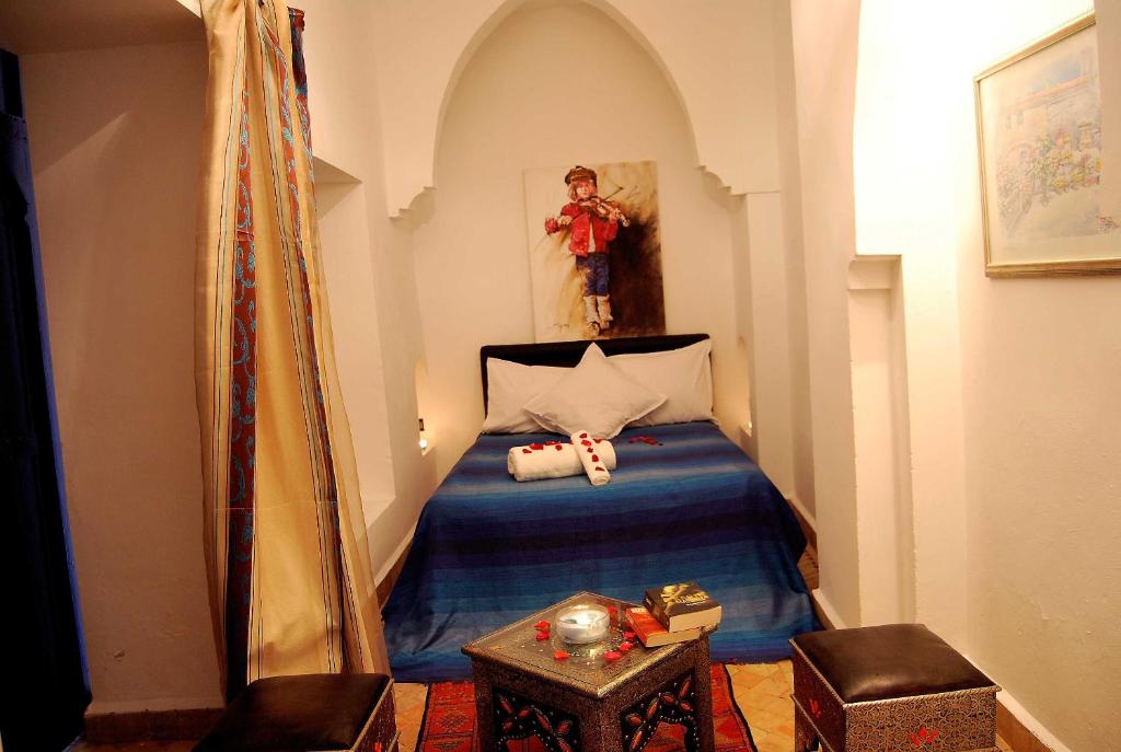 Postel nebo postele na pokoji v ubytování Hotel Riad Todos