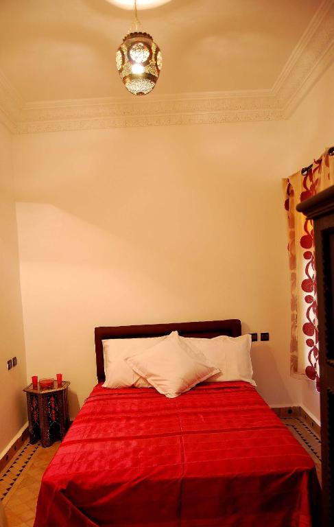 Postel nebo postele na pokoji v ubytování Hotel Riad Todos