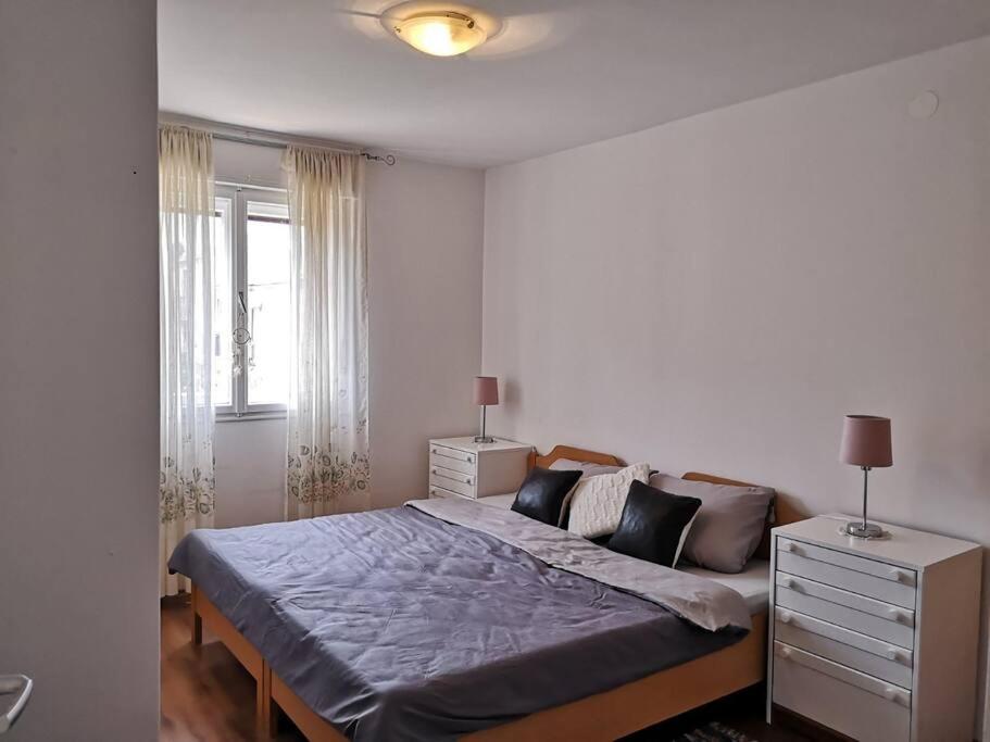 Postel nebo postele na pokoji v ubytování Leda