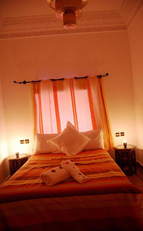 Postel nebo postele na pokoji v ubytování Hotel Riad Todos