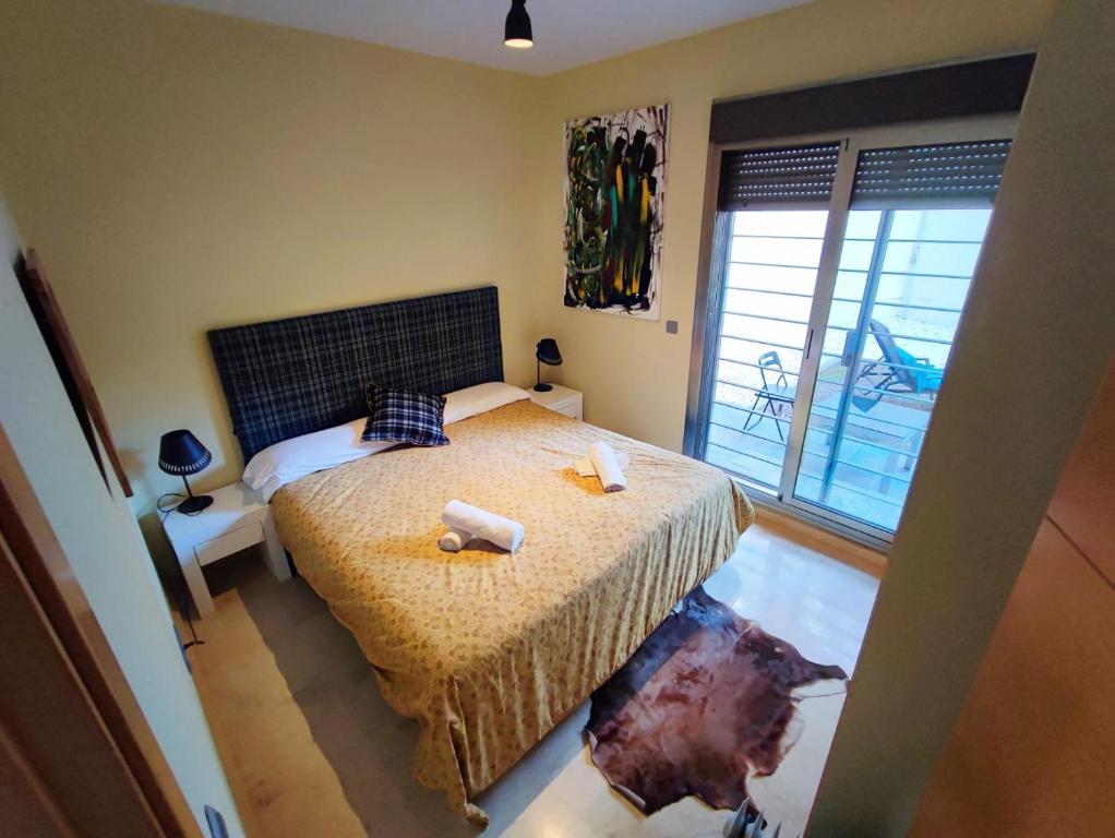 Posteľ alebo postele v izbe v ubytovaní Villa Aguilas Club Guest house