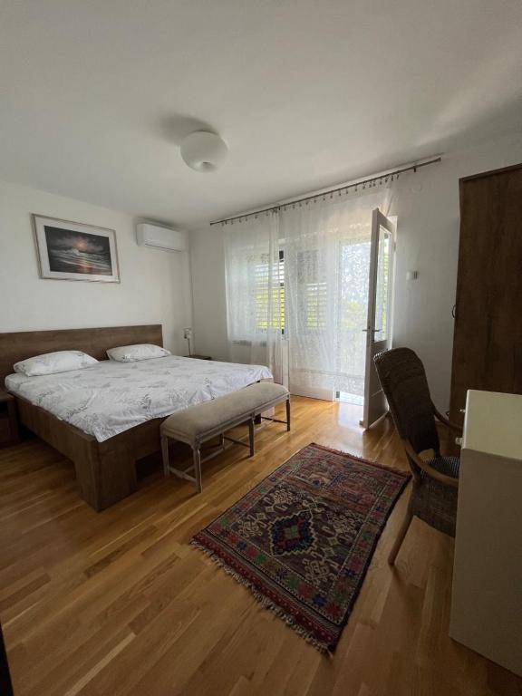 Postel nebo postele na pokoji v ubytování Villa EnaS