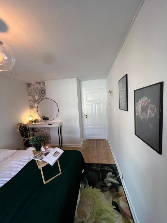 Postel nebo postele na pokoji v ubytování Kongenstofte house