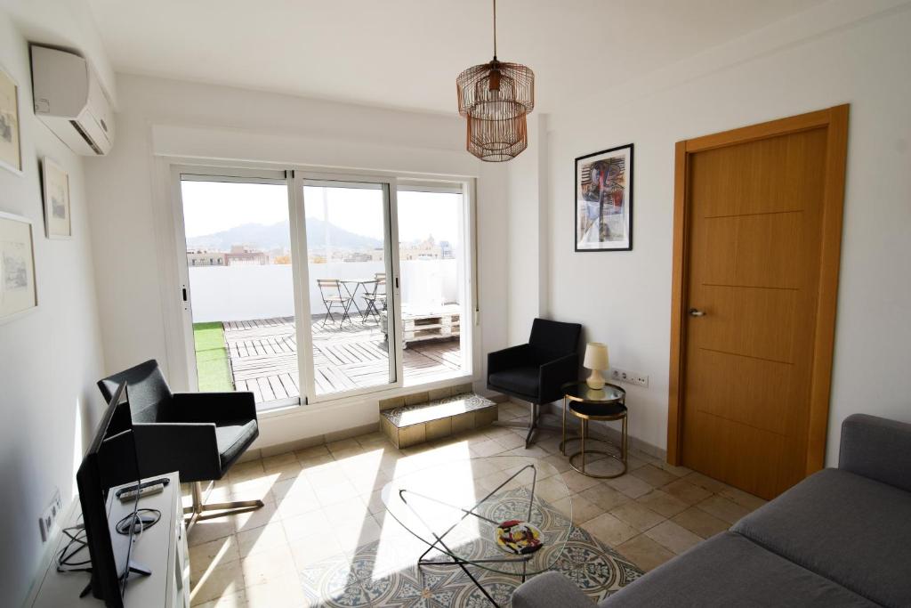Posezení v ubytování Letmalaga Malasaña City Views Superior Apartment