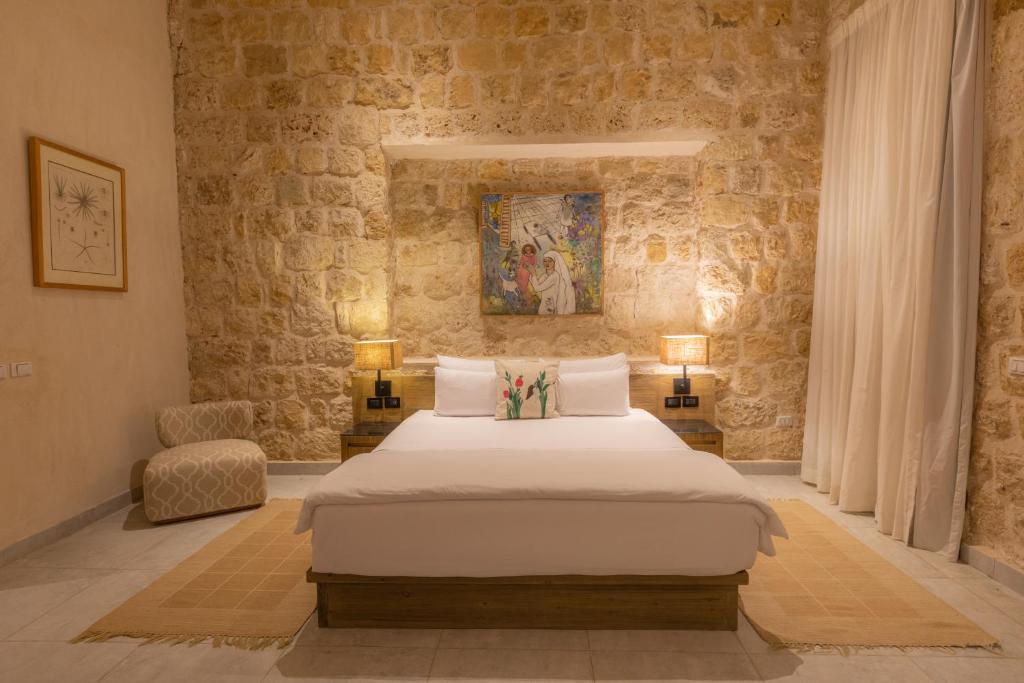 Postel nebo postele na pokoji v ubytování Wadi Sabarah Lodge