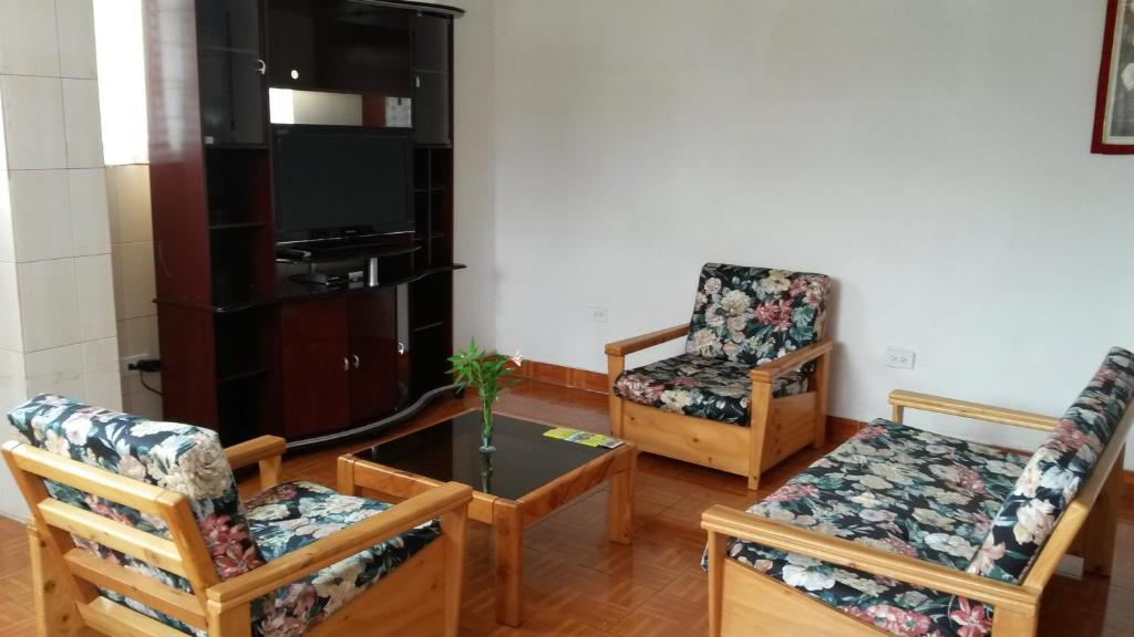 Posezení v ubytování Hostal el Parque Tababela