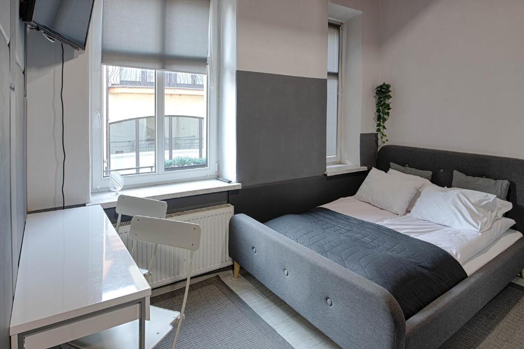 Postel nebo postele na pokoji v ubytování 3 Bros' Hostel Cieszyn