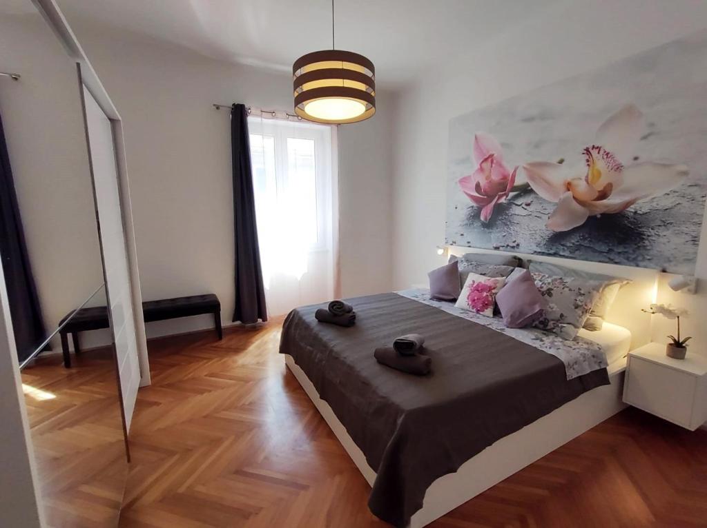 Posteľ alebo postele v izbe v ubytovaní Orchidea Apartment Split in the Centre