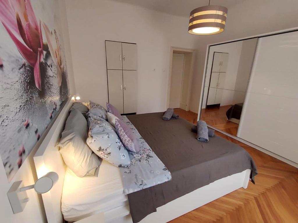 Posteľ alebo postele v izbe v ubytovaní Orchidea Apartment Split in the Centre