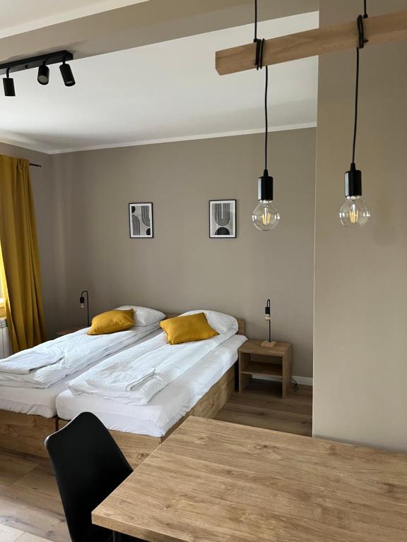 Posteľ alebo postele v izbe v ubytovaní Krollhouse Pokoje gościnne