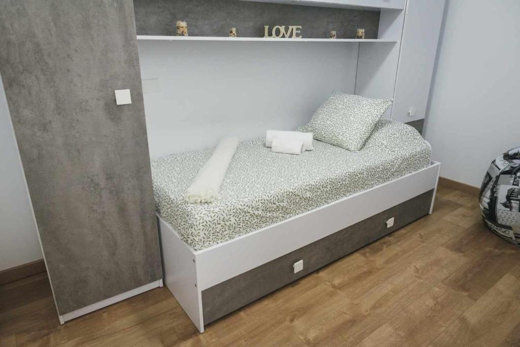 Postel nebo postele na pokoji v ubytování El rinconcito de lola