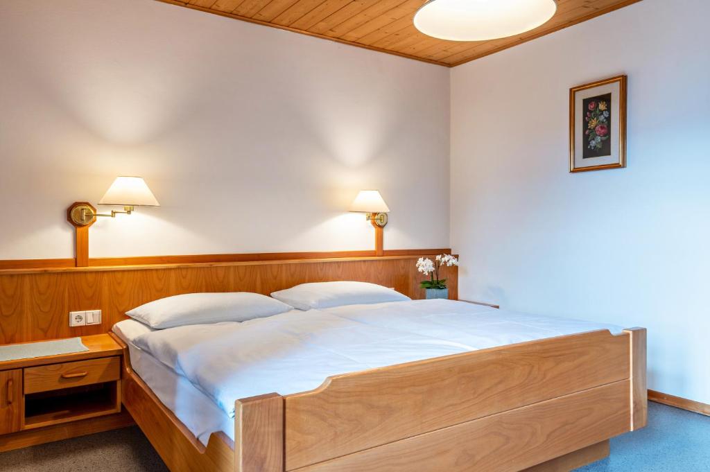 Łóżko lub łóżka w pokoju w obiekcie Taufner Apartement B 107