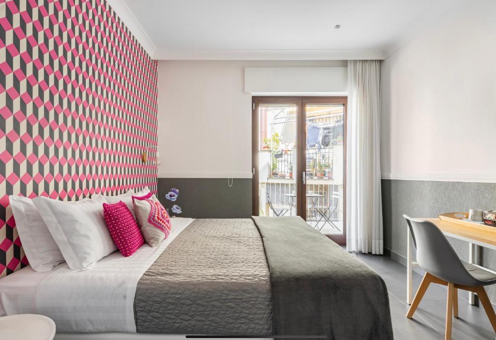 Postel nebo postele na pokoji v ubytování Delle rose inn