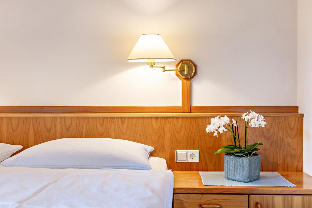 Łóżko lub łóżka w pokoju w obiekcie Taufner Apartement B 107