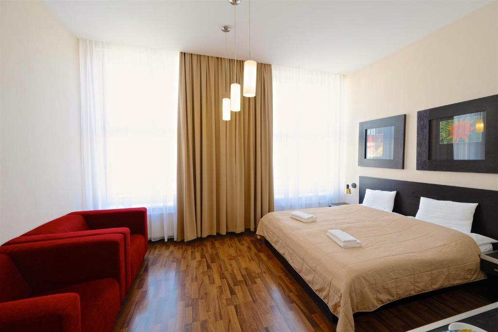 Posteľ alebo postele v izbe v ubytovaní Grand Hotel Trenčin