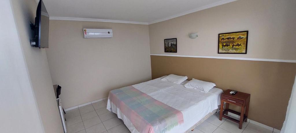 Postel nebo postele na pokoji v ubytování Ecopousada Miriti