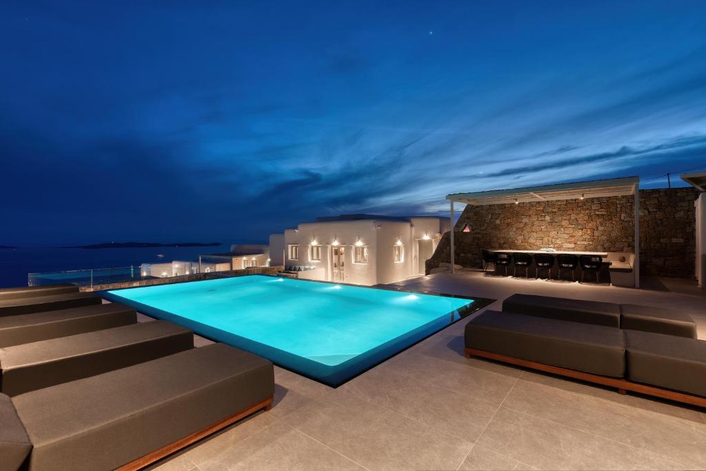 a swimming pool on the roof of a house at Villa Cataleya 1 PRIVATE POOL in Fanari
