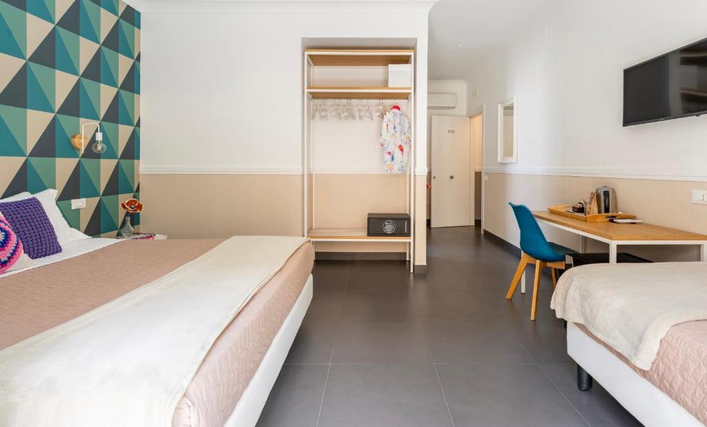Postel nebo postele na pokoji v ubytování Delle rose inn