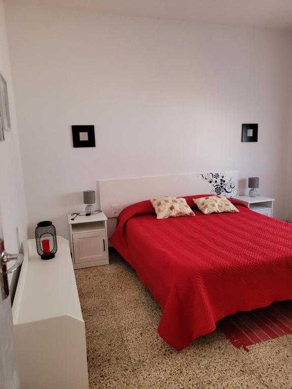 Posteľ alebo postele v izbe v ubytovaní Casa Punta del Sol Vista Al Atlántico
