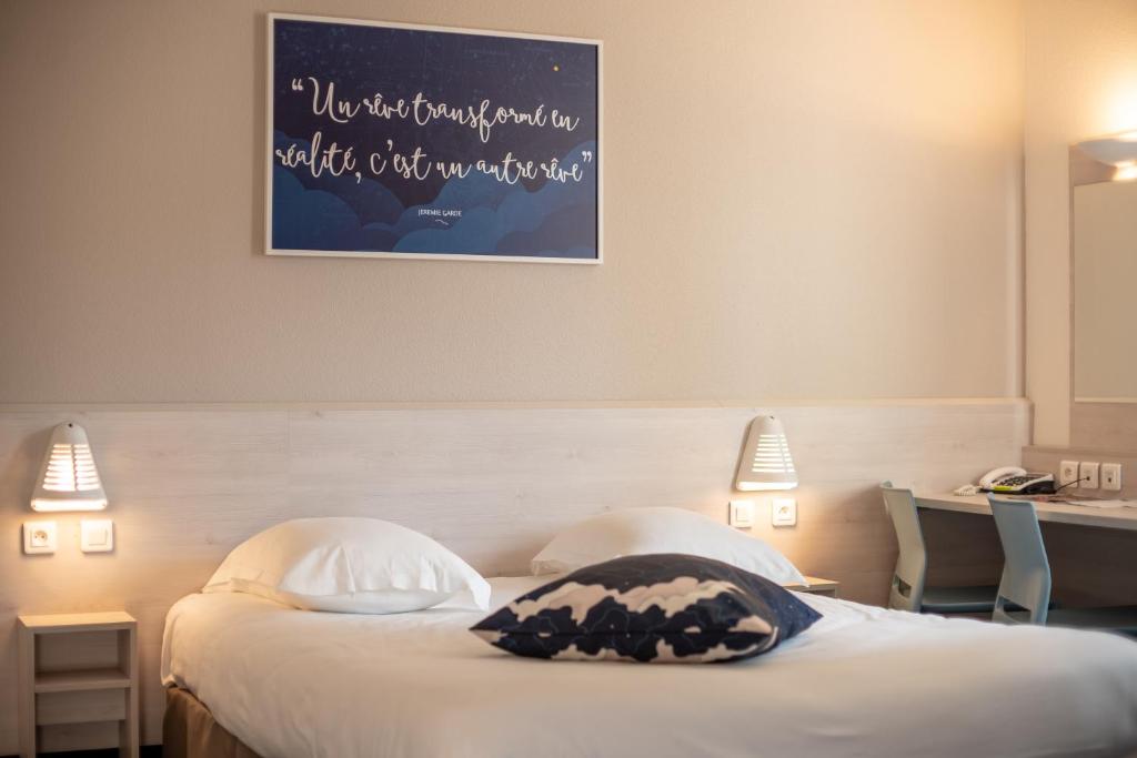 Posteľ alebo postele v izbe v ubytovaní ACE Hôtel Metz